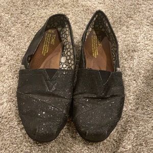 Black glitter Toms, size 10.